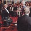 Sir Sean Connery (wearing Clan Maclean Tartan) being knighted by the Queen